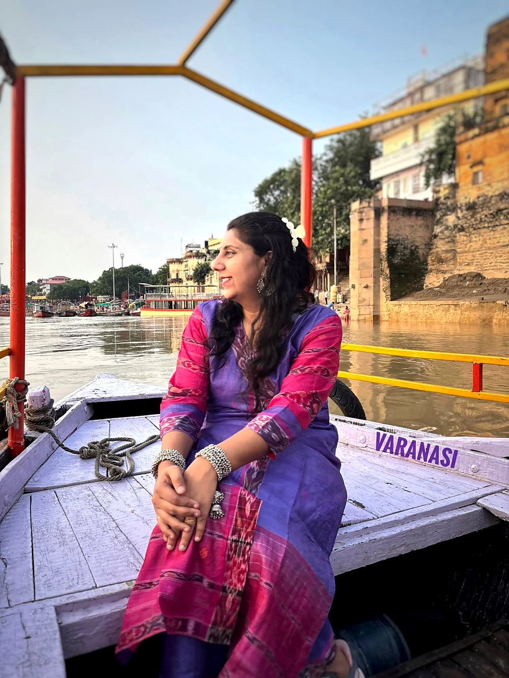 In a boat on the Ganga in Varanasi, the ghats behind