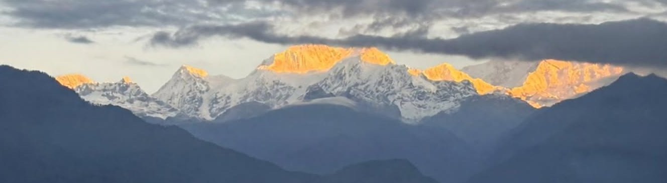 Khangchendzonga minutes later, the peaks lit a deep gold