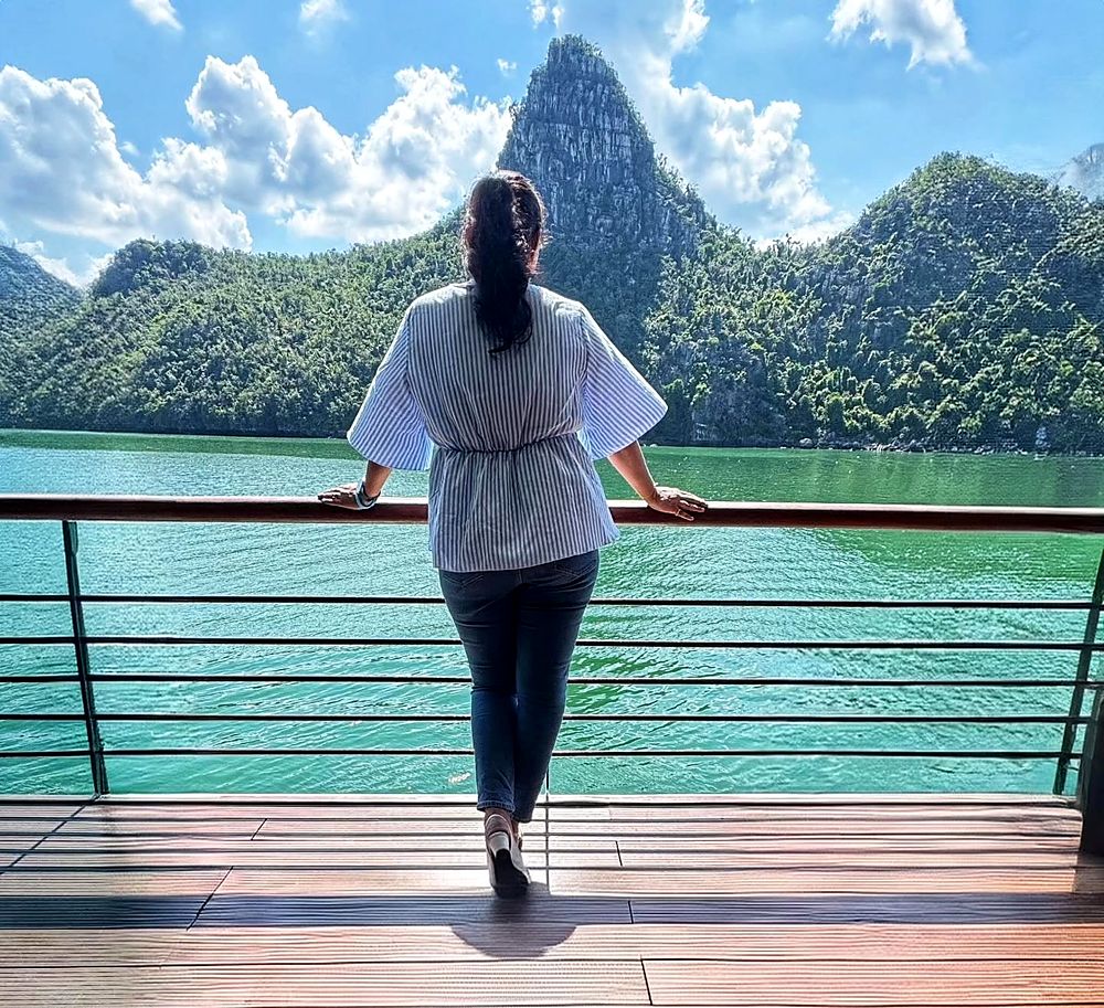 Looking out at the islands of Ha Long Bay from the deck